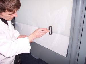 Switchable smart film installation on glass door